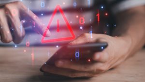 System,Hacked,Warning,Alert,On,Smartphone.,Cyber,Attack,On,Computer